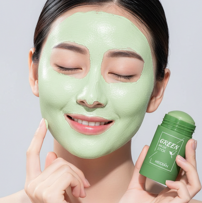 Woman wearing a green facial mask with a green container labeled 'Green Mask' on a light gray background